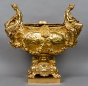 A large gilt bronze jardiniere
Of oval form, surmounted with figures emblematic of The Seasons.