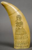 A scrimshaw whales tooth
Decorated to one side with a sailing vessel,