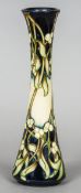 A modern Moorcroft pottery limited edition Mistletoe Memories vase by Rachel Bishop
Signed,