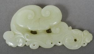 A celadon jade carving of Lingzhi
10 cm long.