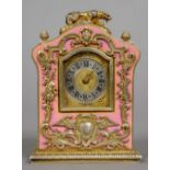 A pink enamel decorated unmarked silver gilt desk clock
The domed top surmounted with a tiger.  9.