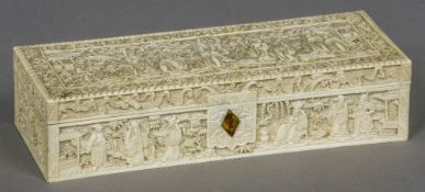 A 19th century Cantonese carved ivory box
Of hinged rectangular form,
