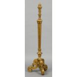 A 19th century carved giltwood torchere
The canted triangular column with acanthus and trailing