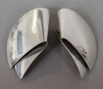 A pair of Georg Jensen silver ear clips, numbered 200
Each 4.5 cm high.