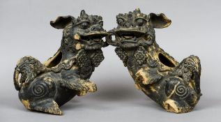 A pair of Chinese pottery temple dogs,