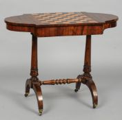 A 19th century parquetry topped games table
The shaped top centred with a removable panel,
