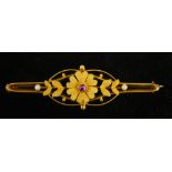 An Edwardian 15 ct gold pink sapphire and seed pearl set floral brooch
5.5 cm wide.