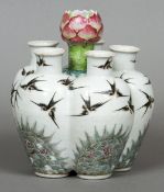 A 19th century crocus vase
Of lobed form, decorated with birds.  19 cm high.