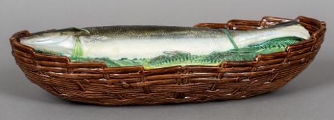 A Victorian George Jones majolica salmon fish tureen and cover
With brown ozier moulded tureen base