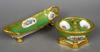 A 19th century Paris porcelain inkwell and pen tray
Each decorated with floral sprays and gilt