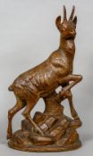 A 19th century Black Forest carving of a Chamois
Worked atop a rocky outcrop.  62.5 cm high.