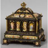 A 19th century ormolu and enamel decorated ebony table cabinet
The domed top surmounted with a