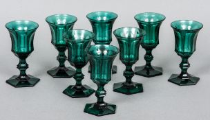 A set of eight Bohemian green wine glasses
Each of fluted chamfered form.  Each 13 cm high.