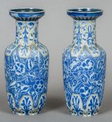 A pair of Doulton Lambeth pottery vases by Edith D.
