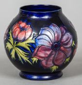 A Moorcroft pottery Anemone vase
Variously marked to base.  17 cm high.