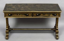 A chinoiserie lacquered two drawer writing table
Decorated in black and gold with numerous figures