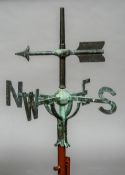 A wrought and cast metal weather vane
Of typical construction.  94 cm high overall.