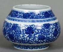 A Chinese porcelain blue and white bowl
Decorated in the round with lotus strapwork,