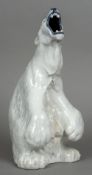 A Copenhagen porcelain polar bear
Modelled seated on his haunches roaring skyward,