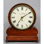 A Victorian mahogany mantel clock
With fusee movement, the dial with Roman numerals inscribed Thos.
