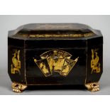 A Chinese Export lacquered tea caddy
Typically decorated and enclosing a pair of white metal lidded