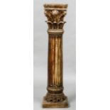 An early 20th century carved wood Corinthian capped fluted column
Standing on a plinth base.  152.