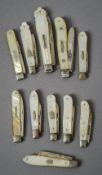 A collection of eleven mother-of-pearl handled silver folding fruit knives,