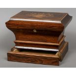 A 19th century French marquetry inlaid rosewood sewing box
The domed hinged rectangular top inlaid