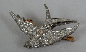 An unmarked rose diamond set pendant/brooch
Formed as a swallow.  4.5 cm wide.