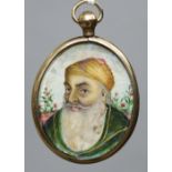 A 19th century Indian portrait miniature
Oval glazed and in unmarked gold frame with suspension