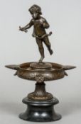 A 19th century patinated bronze lidded urn on stand
The removable lid modelled with a putto.