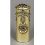 A Russian 56 gold diamond mounted cigar holder
Decorated with diamond set trailing swags and