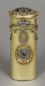 A Russian 56 gold diamond mounted cigar holder
Decorated with diamond set trailing swags and