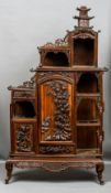 A 19th century Chinese side cabinet
Of stepped architectural form,