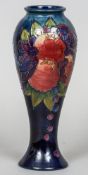 A Moorcroft pottery Blue Finches vase by Sally Tuffin
Variously marked to base.  27.5 cm high.