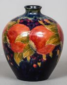 An early 20th century William Moorcroft pottery Pomegranate vase
Signed and impressed marks to base.