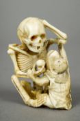 A late 19th century Japanese ivory okimono
Intricately carved as a skeleton and a monkey,