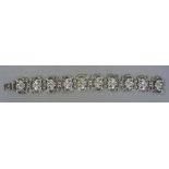 A WMF 835 silver bracelet
Of pierced floral form.  18.5 cm long.