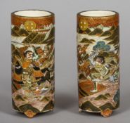 A pair of early 20th century Japanese Satsuma pottery vases
Each decorated with warring figures in