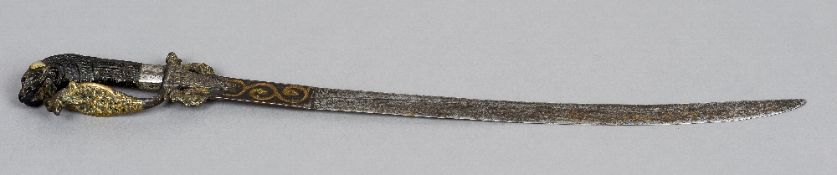 An 18th century Sri Lankan kastane sword
With typically carved and cast handle and hilt;