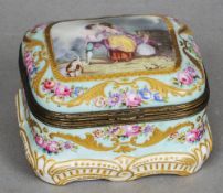 A Continental porcelain trinket box
Of square section, the hinged cover with figural vignette,