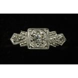 An Art Deco 9 ct gold platinum three stone diamond ring CONDITION REPORTS: Overall