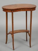 A Victorian painted satinwood kidney shaped side table
The crossbanded top painted with bow tied