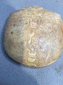 An Egyptian carved stone scarab seal
The matrix worked with four columns of hieroglyphics.