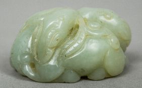 A Chinese jade animalier group
Modelled as a pair of entwined rams.  5.25 cm wide.