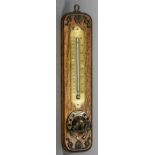 A 19th/20thcentury brass  mounted oak wall hanging thermometer
Incorporating an equine themed