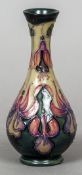 A modern Moorcroft Collectors Club Fuchsia vase
Numbered 568 and variously marked to base.  16.