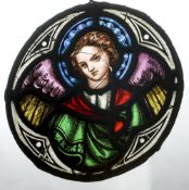 A mid 19th century stained glass panel
Painted with an angel.  18.5 cm diameter.