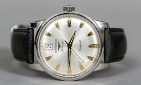 A Longines Automatic Conquest gentleman's wristwatch
The silvered dial with batons.  3.75 cm wide.