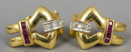 A pair of contemporary 18 ct gold diamond and ruby set ear clips
Each 1.5 cm high.